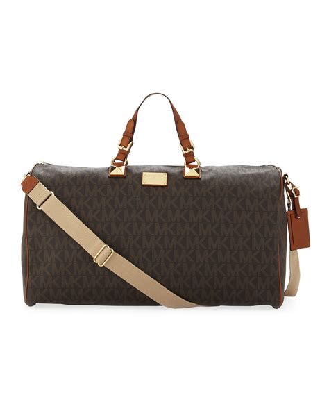 michael kors harrison logo duffle bag|Michael Kors travel suitcase.